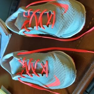 A pair of Nike sneakers, gently worn, still have life